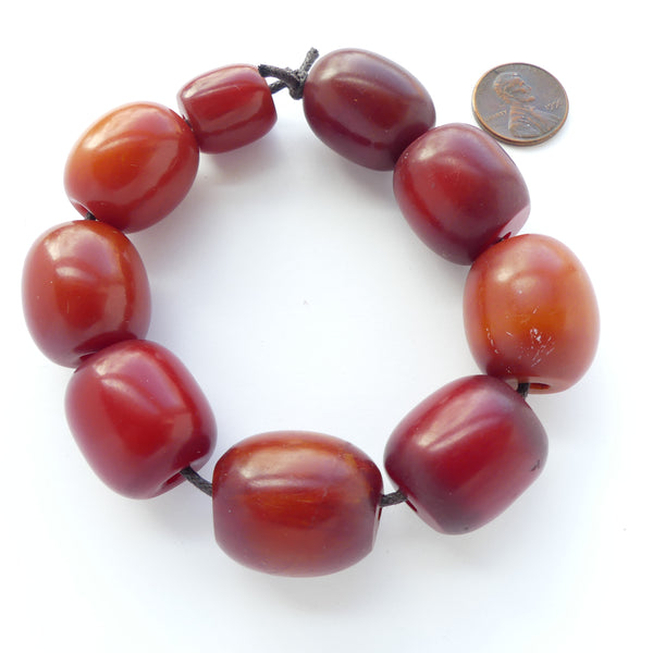 Red Amber, Vintage East African, Oval Most about 24x20 with Variations, Sold as Set of 9