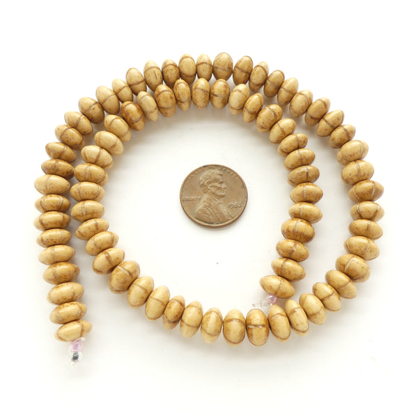 Bone, Rondelles in Warm Amber Color with Darker Decorative Lines 4x9mm on 16-inch Strands