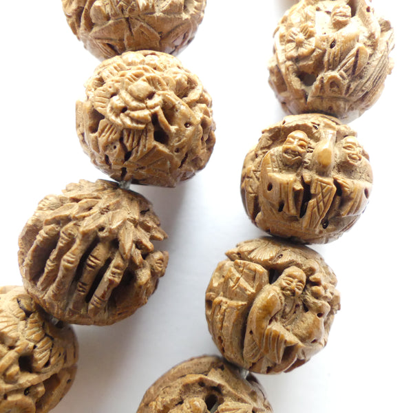 Wood, Fruit Pit with Extraordinarily Detailed Carving, 13mm Diameter Beads, Strand of 27