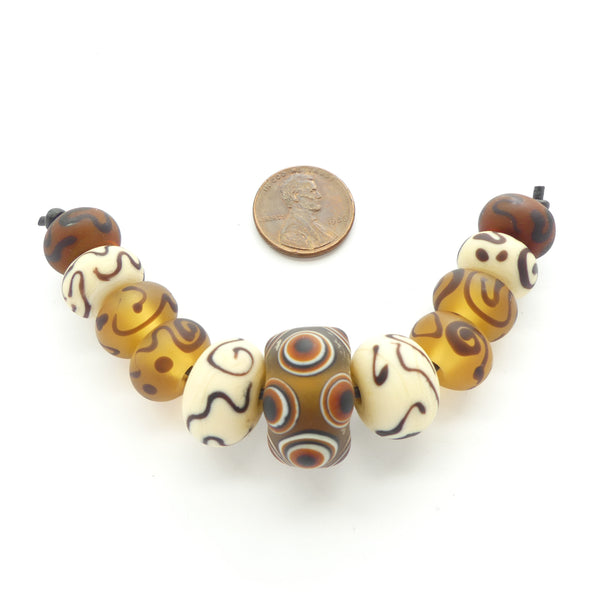 Contemporary. Glass Beads, Set of 11 in Earth Tones & Ivory, Largest 22mm Diameter