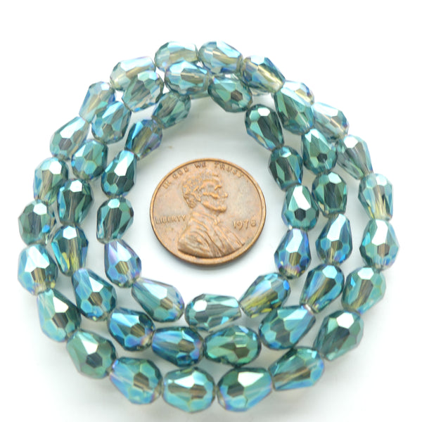 Faceted Glass, "Dragon Crystal" 6x8mm Teardrop Transparent Blue Iris on 16-inch Strands