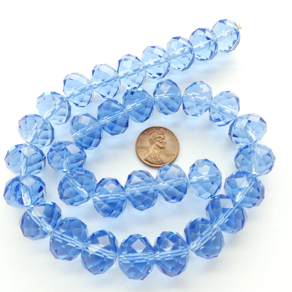 Faceted Glass, "Dragon Crystal" 12x14mm Light Sapphire on 16-inch Strand