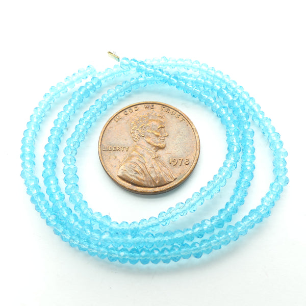 Faceted Glass, "Dragon Crystal" 1x2mm Translucent Aqua on 13-inch Strands