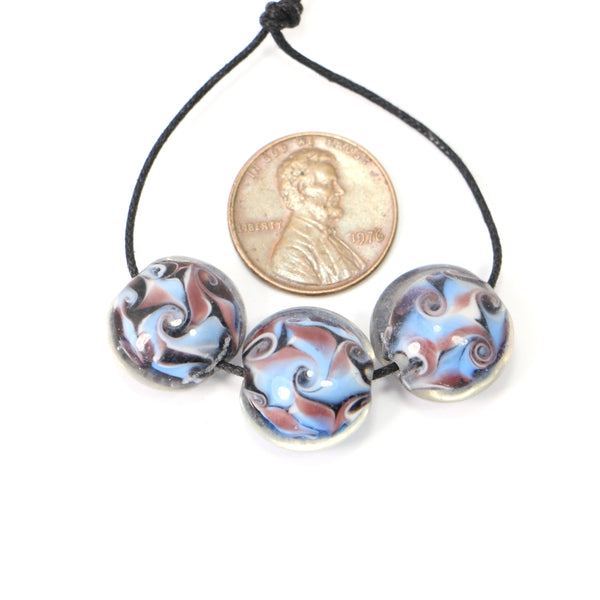 Puffy Coin Shape Beads, 11mm Diameter, Blue & Purple Swirls In Clear Glass, Set of 3