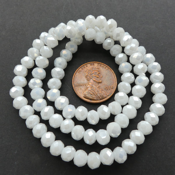 Faceted Glass, "Dragon Crystal" 4x6mm White Luster Opaque on 16-inch Strands