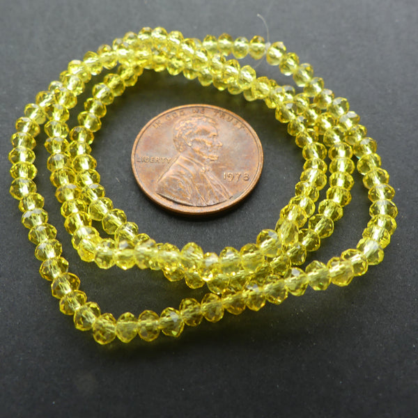 Faceted Glass, "Dragon Crystal" 2x3mm Yellow Translucent on 16-inch Strands