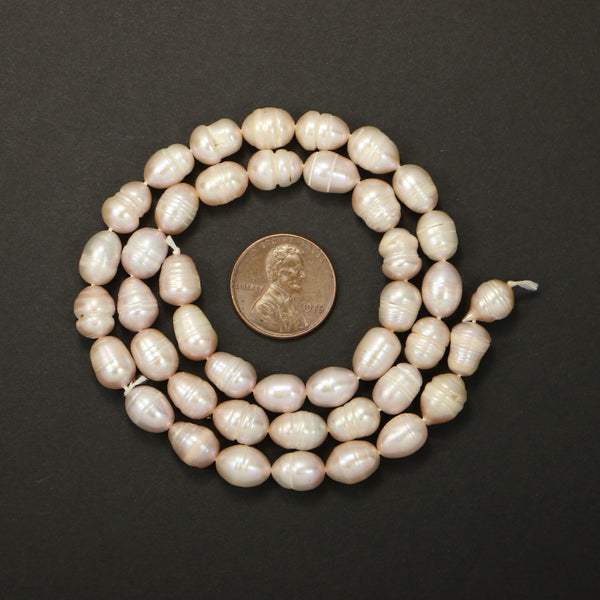 Pearls, Pink, Large but Irregular Ovals 9x7mm on 16-inch Strand