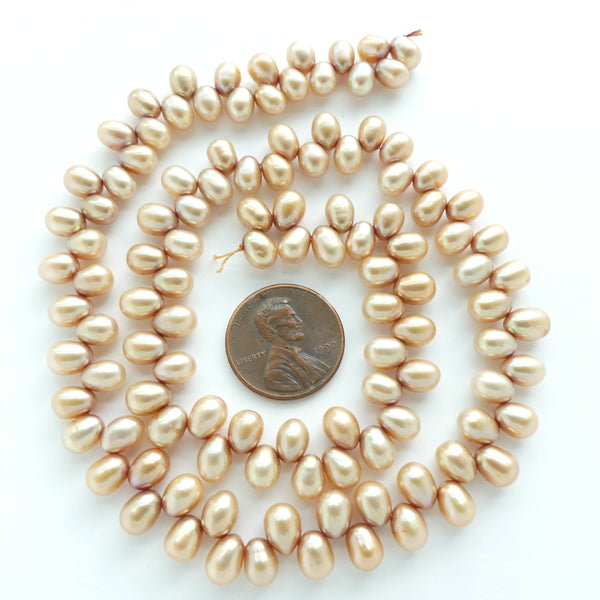 Pearls, Champagne, Dancer Shape, 3x7mm on 16-inch Strand