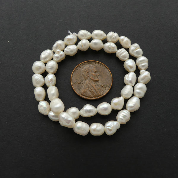Pearls, White, Oval Shape, 7x4mm on 10-inch Strands