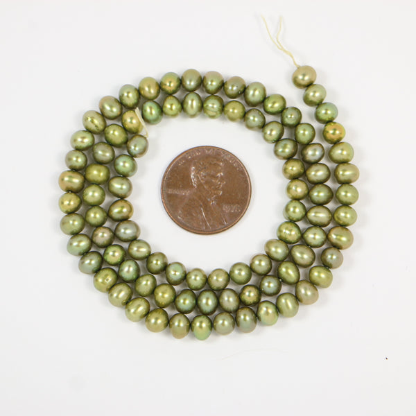 Pearls, Green Iris, Egg Shape 6x7mm on 16-inch Strand