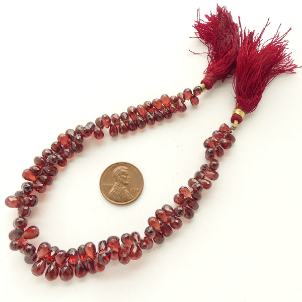 Garnet, Faceted Drop Style Briolettes, Slightly Graduated on 9-inch Strand