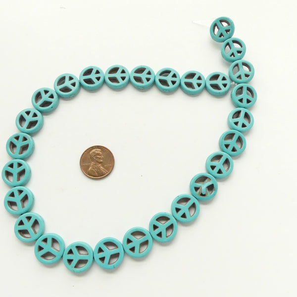 Magnesite Dyed Turquoise, Peace Sign 15mm Diameter on 16-inch Strands