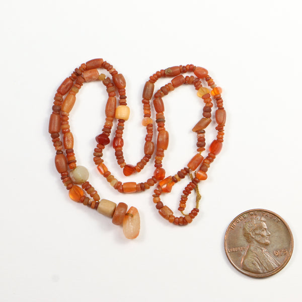 Ancient, Bactrian Carnelian Beads from Afghanistan, 15-inch Strand with Small Pendant