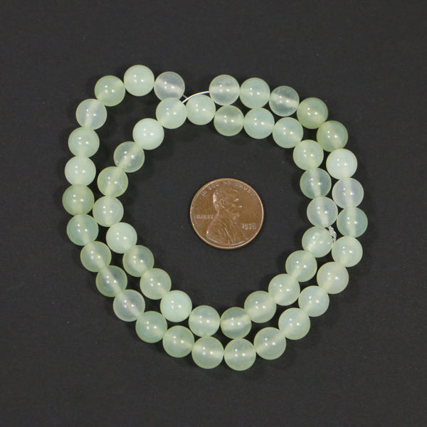 New Jade, Round 7mm Diameter, Light Translucent Green on 16-inch Strands