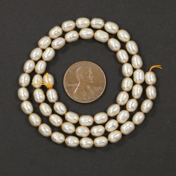 Pearls, Champagne, Rice Shape, 6x5mm on 14-inch Strand