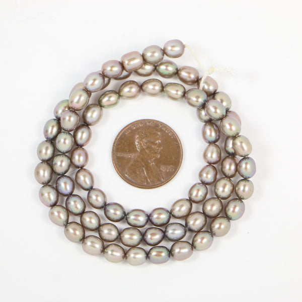 Pearls, Silver, Oval Shape, 7x5mm on 16-inch Strand
