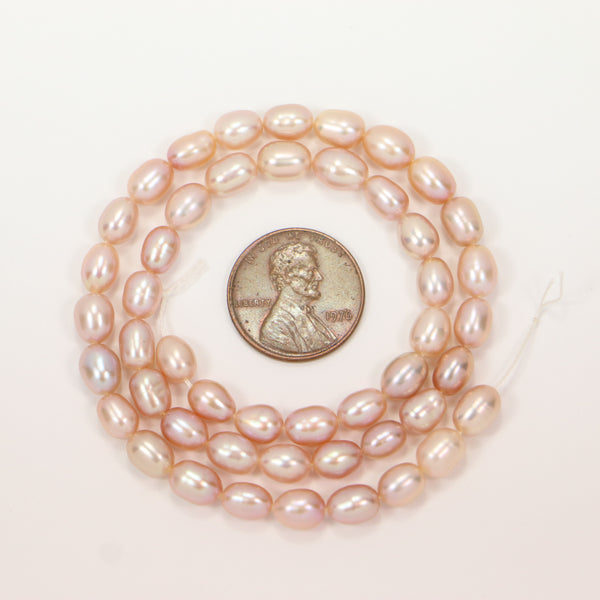 Pearls, Pink, Oval Shape 7x5mm on 13-inch Strand