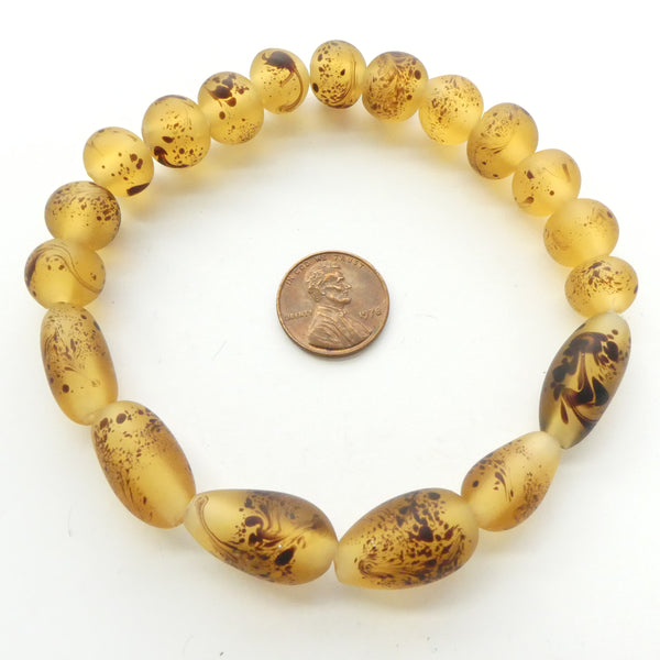 Marie-Jose Opper, Short Strand of Amber Beads with Black Speckles, 19 beads