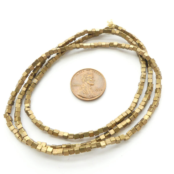 Brass, Cube Beads 2x2mm on 24-inch strand