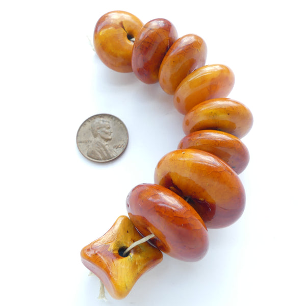 Resin, Rondells, Burnt Orange, Graduated largest 12x28mm, Sold as a Set of 9