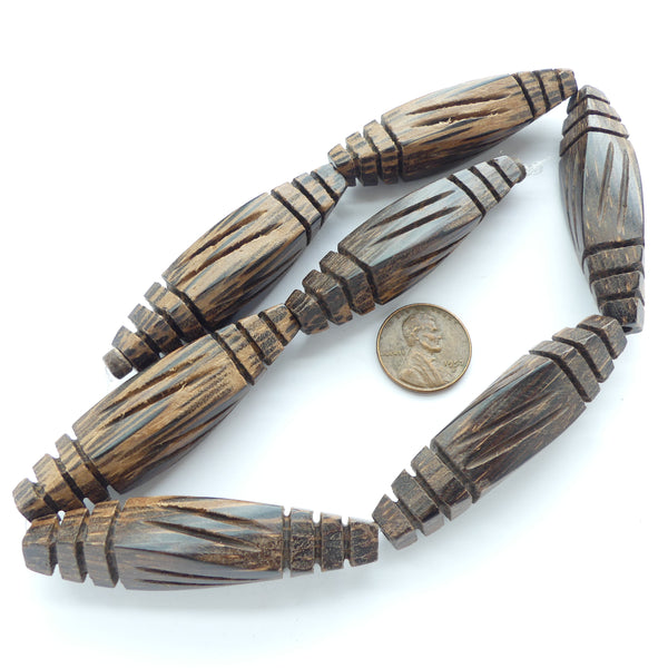 Wood, Carved Robles Wood 4-Sided Twisted Ovals, 57x14mm on 16-inch Strands