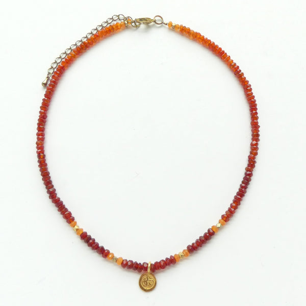Necklace, Carnelian 4mm Faceted Beads with Gold Om Pendant, 18 inches