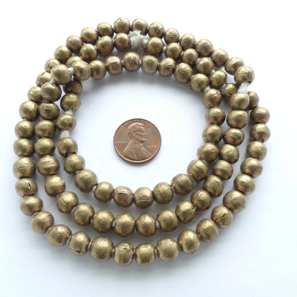 Brass, Round Ethiopian, 8mm on 28-inch Strand