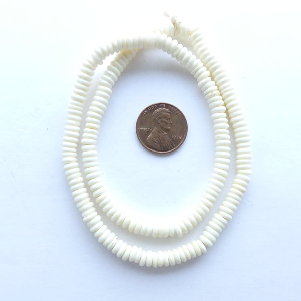 Bone Slices, Strand of White 1.5x5mm Beads