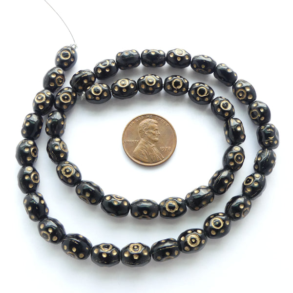 Czech Molded Glass Ovals, 9x7mm, Black with Gold Designs, 16-inch Strand