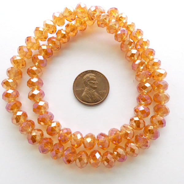 Faceted Glass "Dragon Crystal" 6x8mm, Peach Luster, 16" Strands