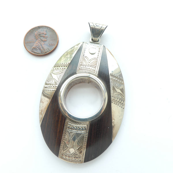 Morocco Silver & Ebony Pendant, by Master Tuareg Silversmith, Oval 3 inches Long with Bail