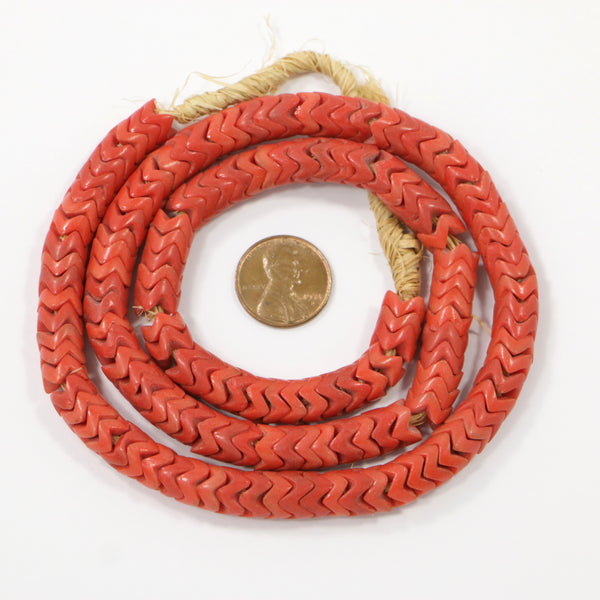 Snake Beads, Red-Orange Molded Glass 9mm Diameter on 20-inch Strands