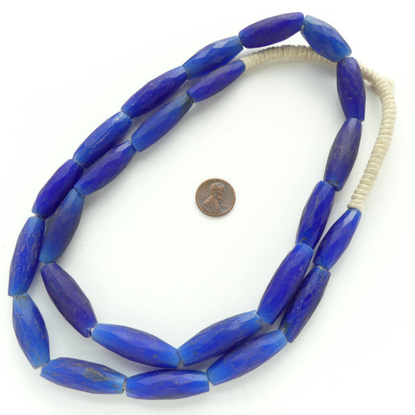 Russian Blues, Long Faceted Bicones, Royal Blue, Most 35x12mm on 32-inch Strand