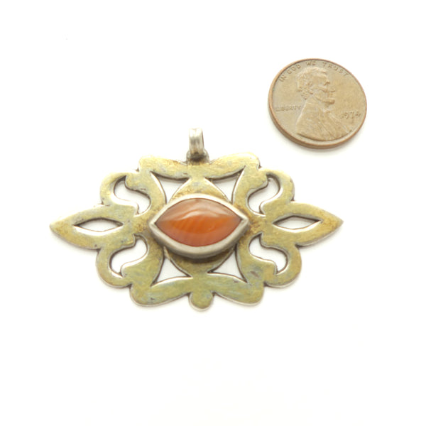 Turkoman, Pendant, Antique Silver with Fire-Gilding and Carnelian Cabochon, 2" wide