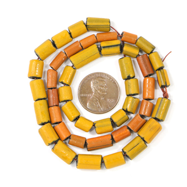 Indonesia, Pumpkin/Mustard Color Cylinder beads 4-5mm Diameter 7-12mm long, 15-inch Strand