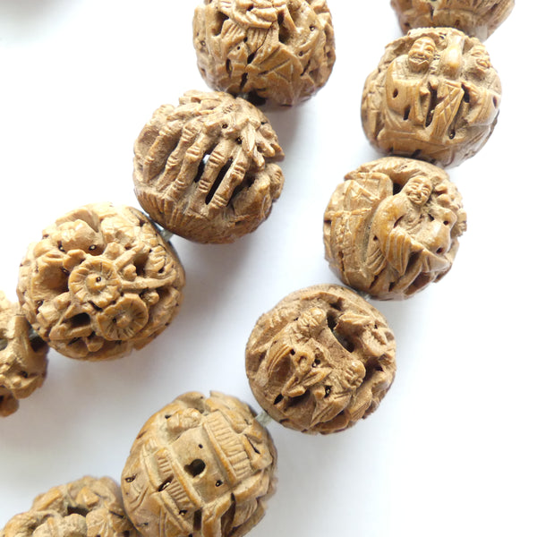 Wood, Fruit Pit with Extraordinarily Detailed Carving, 13mm Diameter Beads, Strand of 27
