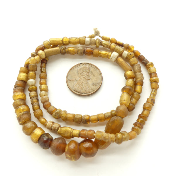 Ancient Gold Glass Beads, Assorted Shapes 2-9mm, on 21-inch Strand