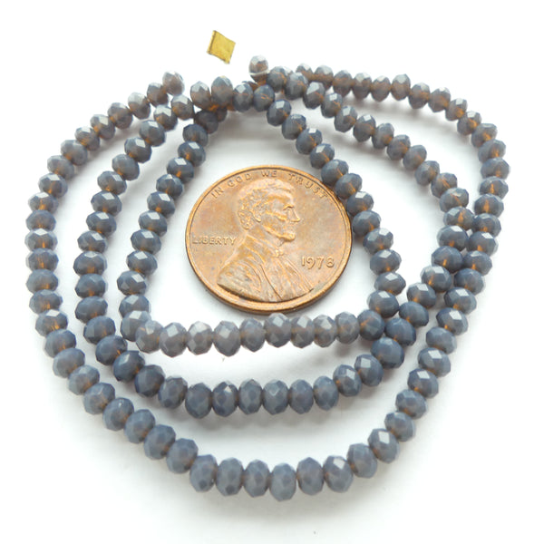 Faceted Glass, "Dragon Crystal" 2x3mm Dark Grey AB on 16-inch Strands