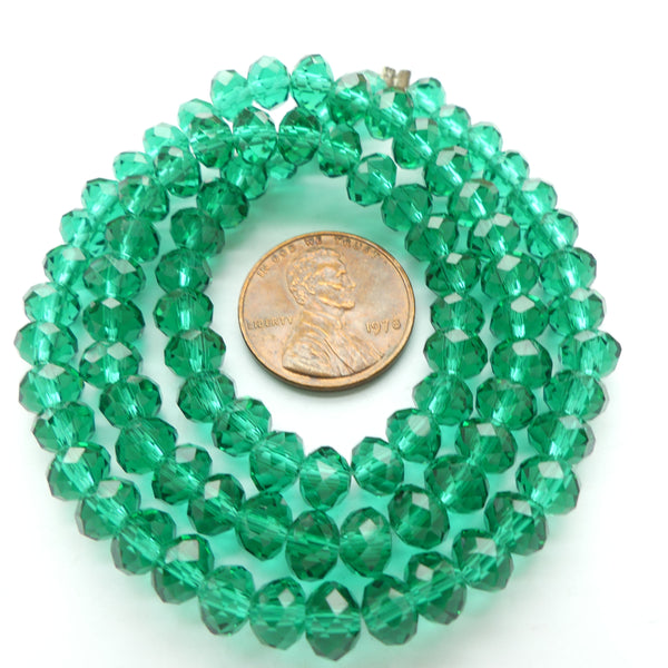 Faceted Glass, "Dragon Crystal" 5x6mm Translucent Emerald on 16-inch Strands