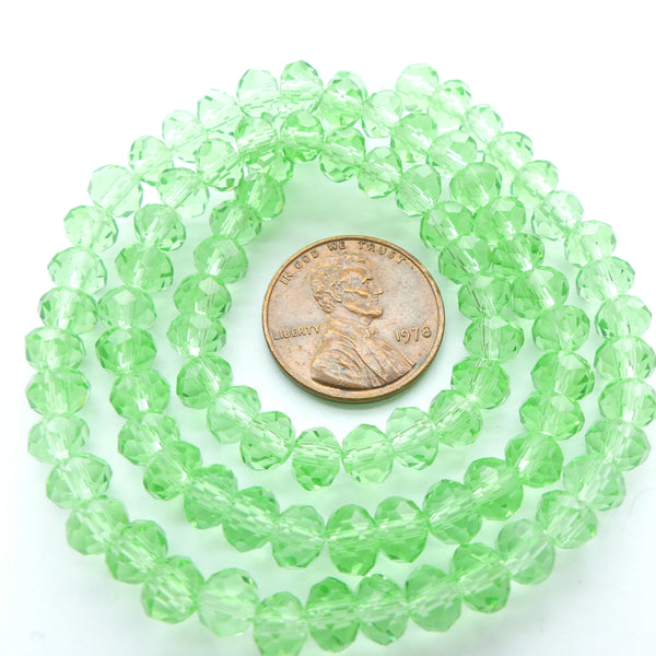 Faceted Glass, "Dragon Crystal" 4x6mm Light Translucent Green on 16-inch Strands