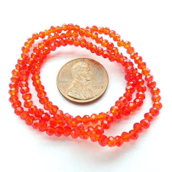 Faceted Glass, "Dragon Crystal", 2x3mm, Translucent Red-Orange on 15-inch Strands