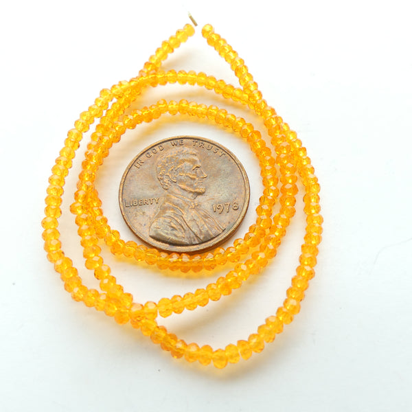 Faceted Glass, "Dragon Crystal", 1x2mm, Translucent Orange on 12-inch Strands