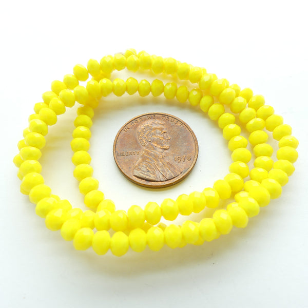 Faceted Glass, "Dragon Crystal" 3x4mm Opaque Yellow on 16-inch Strands