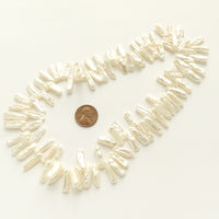 Pearls, White, Keshi Sticks 14-16mm long on 16-inch Strands