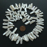 Pearls, White, Keshi Sticks 14-16mm long on 16-inch Strands