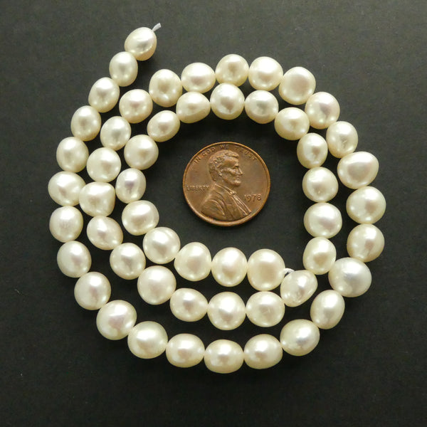 Pearls, White, Oblate (Slightly Flattened Round), 7mm on 16-inch Strands