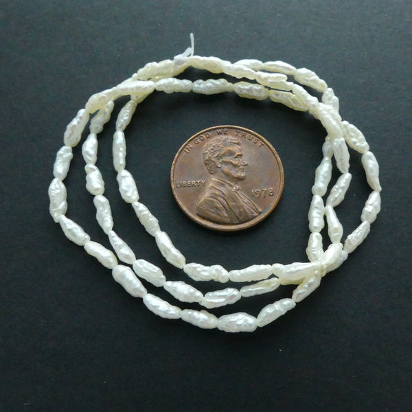 Pearls, White, Rice Shape Mini Baroque 6x2mm on 16-inch Strands