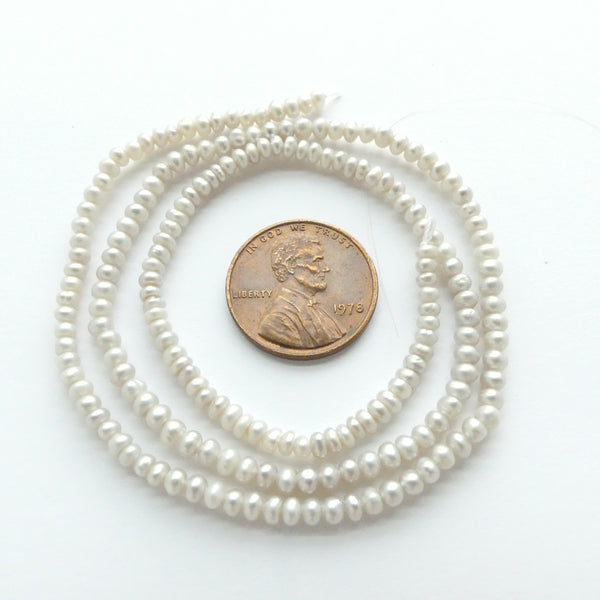 Pearls, Silvery/Very Light Grey,  Mini Oblates 2-3mm on 16-inch Strands