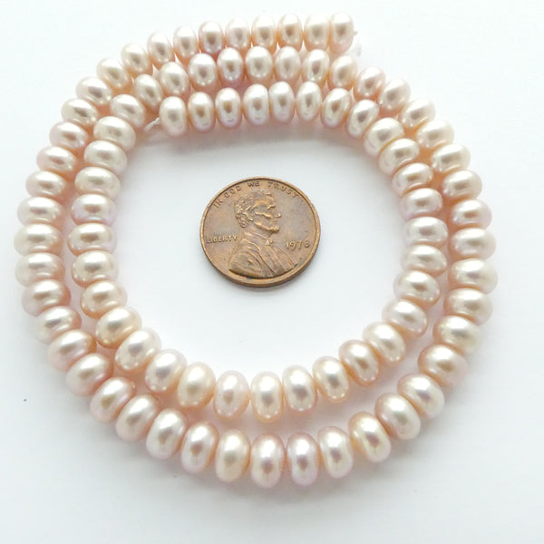 Pearls, Pink, Button Shape Large 5x7mm on 16-inch Strand
