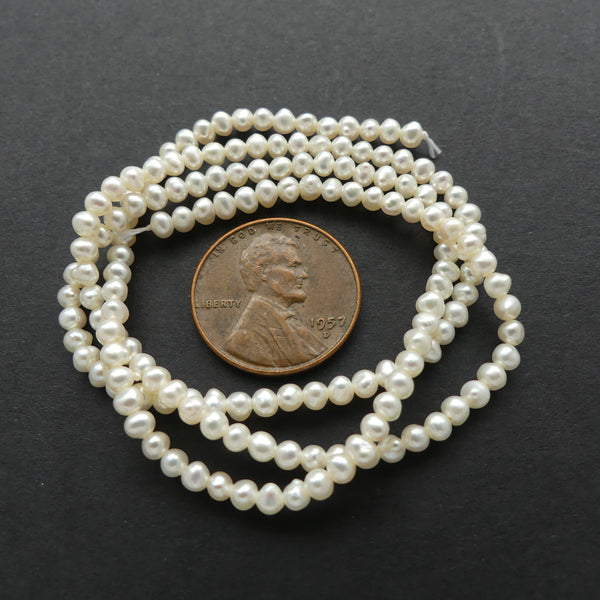 Pearls, White Almost Round 3mm Diameter on 16-inch Strands